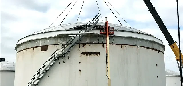 Technician welding a storage tank for reforincement Repair and Welding work on storage tank Astha Tank Construction